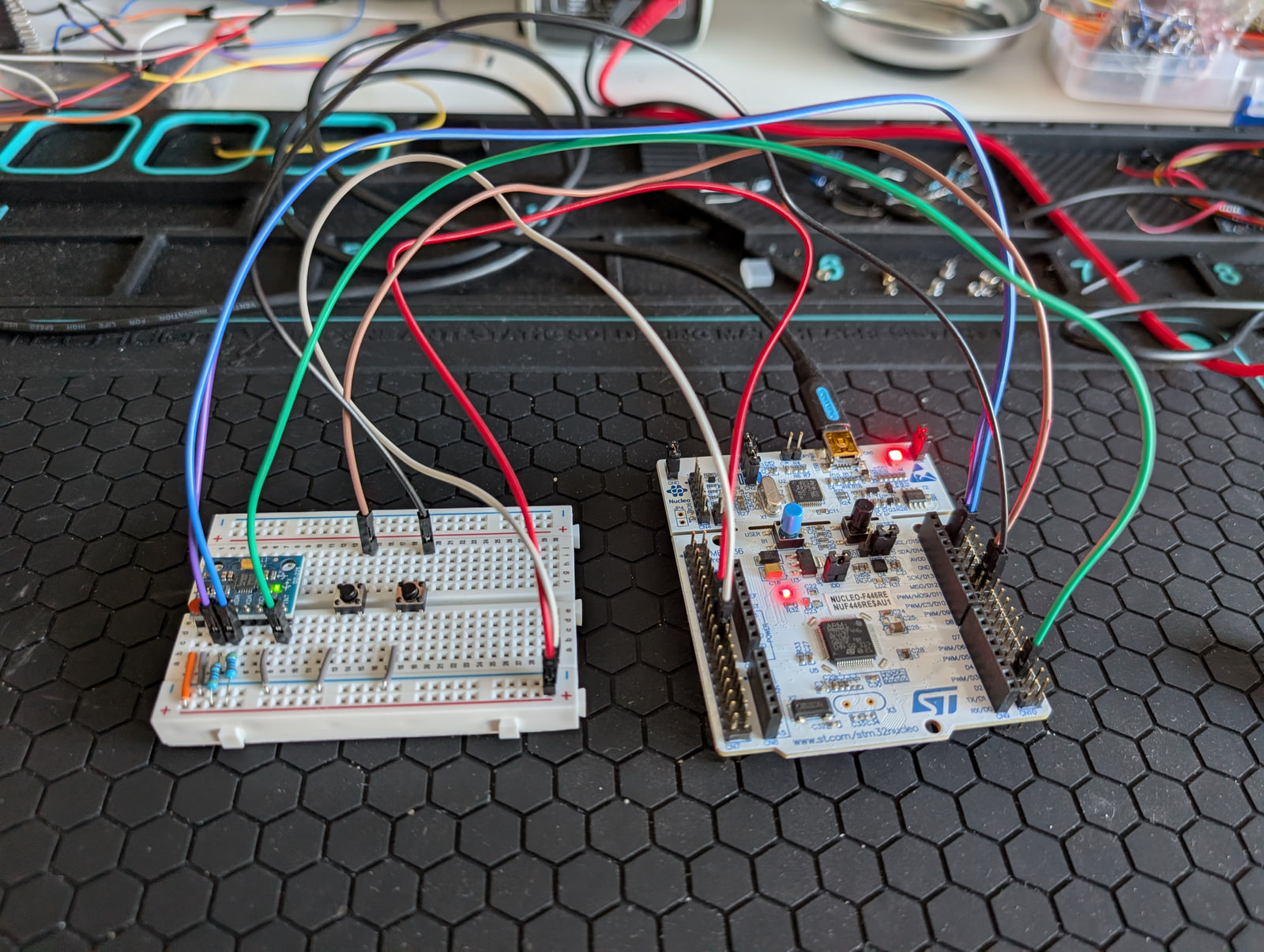 Hardware test setup: an STM32 Nucleo-F446RE board wired to a breadboard with jumper wires